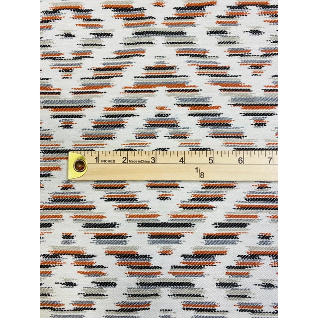 56" wide Graham Sanderson Romo Nicoya Estro indoor outdoor southwestern geometric upholstery fabric in henna orange, cream...