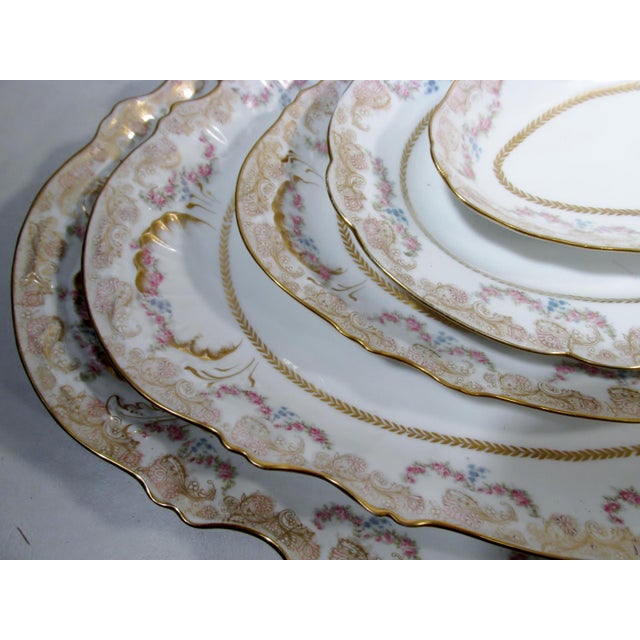 Nesting set of 5 graduated oval serving platters including a massive 20.5" long meat platter, includes: the massive 20.5"...