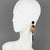 These elegant Angela Caputi resin clip-on earrings, made in Italy, feature an extra-long dangling shape with black color...