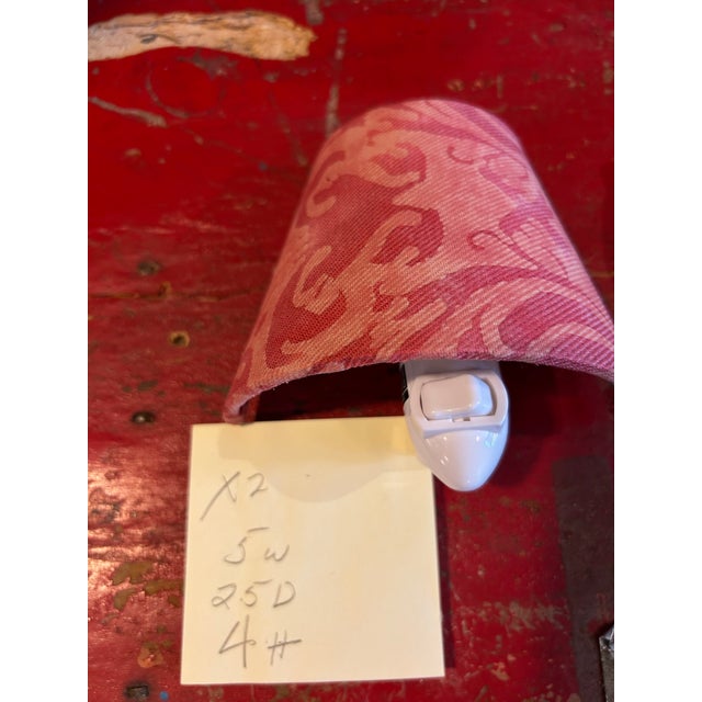 A nightlight handmade with Fortuny’s iconic printed cotton, bulb included