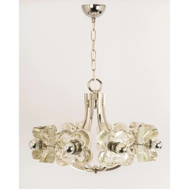 A wonderfully large and high-quality chrome chandelier/pendant light fixture by sische, germany, 1970s it is made of a...