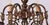 Restored chandelier made of patinated brass. The arms are decorated with fish. The chandelier is fully functional with new...