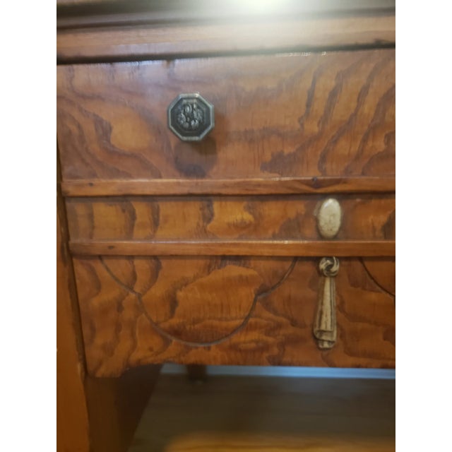Burled wood vanity with beautiful detailing and multiple inlays of wood. Original handles, metal. Hand-laid Chevron...