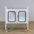 This vintage hospital trolley from the 1970s is a unique and functional design object with character. Produced in Hungary,...