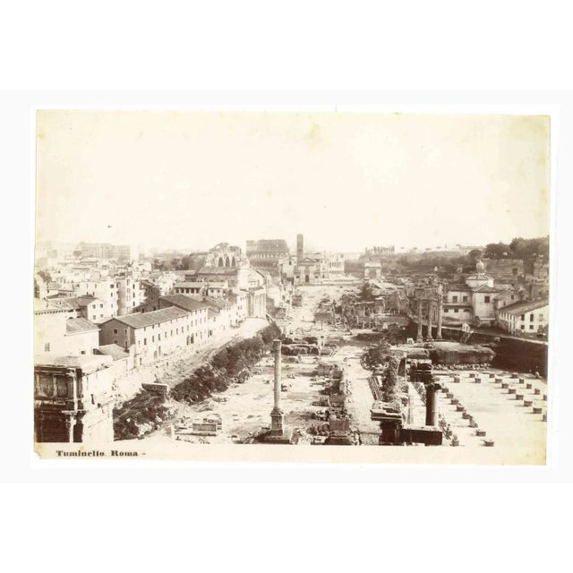 Roman Imperial Forums is a vintage photograph in salt silver realized by Ludovico Tuminello in the early 20th Century....