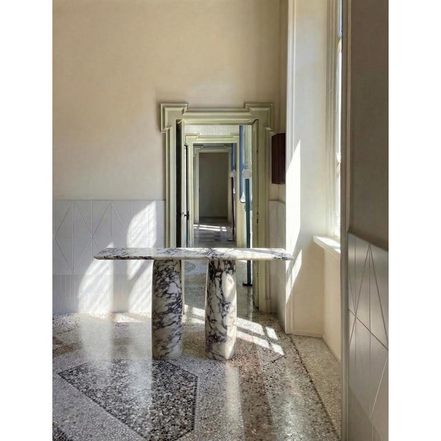 Console made from high-quality viola veined marble. The bellini style pedestals are a sculptures in themselves. my habitat...