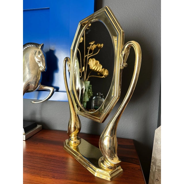 Art Nouveau style brass vanity tilting mirror with swan motifs. Only mirror is 14" x 10"