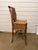 This is a unique English faux-bamboo side chair with seat storage. It is sturdy for anyone needing extra seating and...