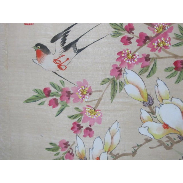 Very sweet Chinese antique painting on fabric of 2 birds perched atop brightly pink, red, and white cherry blossoms. Frame...