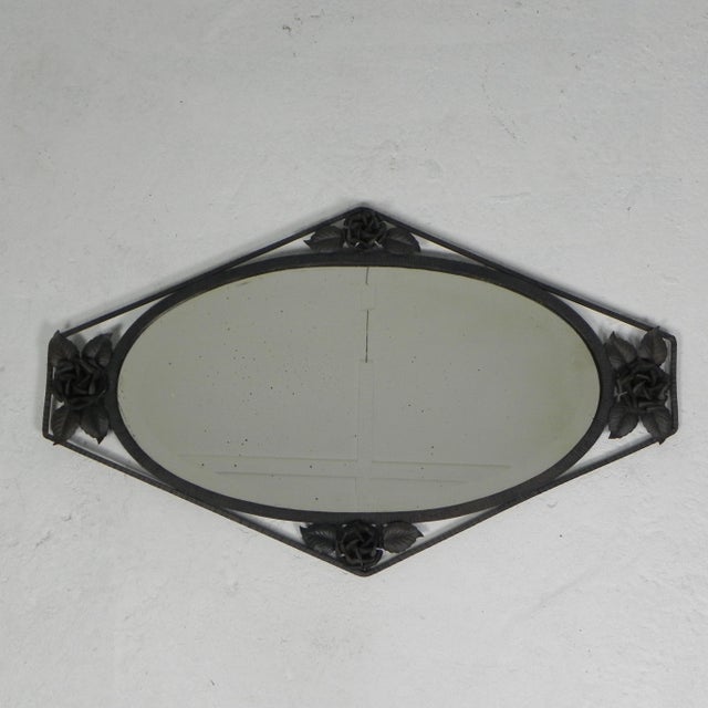 This mirror has a faceted edge. Height: 52 cm. Width: 87 cm. Depth: 6 cm. Faceted mirror dimensions: 34.5 x 67 cm. The...