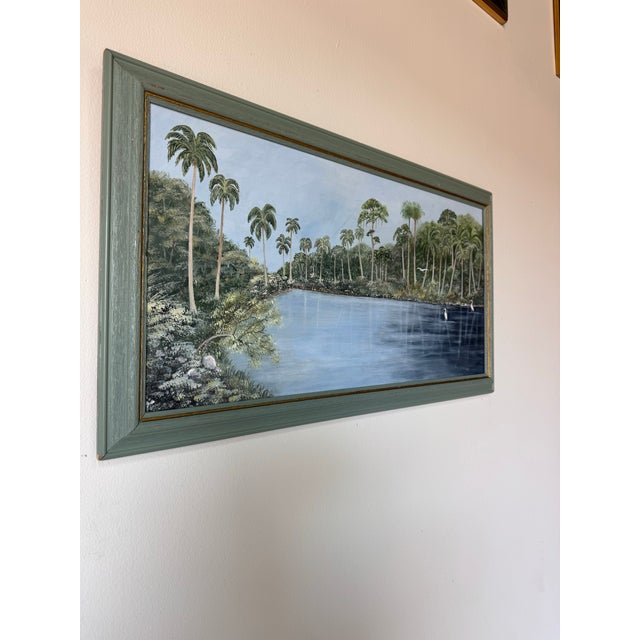 This beautiful vintage oil on canvas painting by Red Spencer captures a serene Florida landscape rendered in the classic...