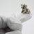 This vintage silver decorative object depicts a sweet puppy dog figurine miniature, crafted as a dollhouse pet accessory,...