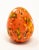 Offering this pair of ceramic glazed eggs. One is bright orange with green and yellow, and has a tree stamped in it. The...