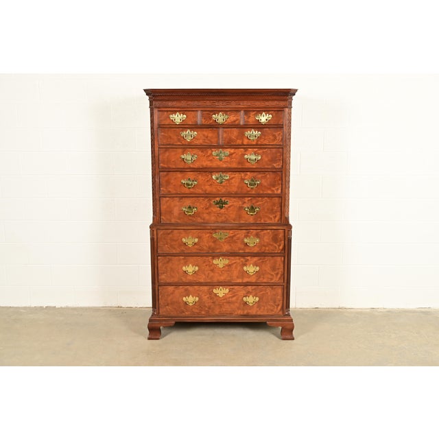 An exceptional Chippendale or Georgian style eleven-drawer highboy dresser or chest of drawers By Baker Furniture,...