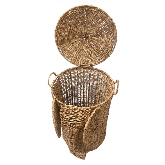 A charming handwoven elephant hamper. Expertly crafted from natural wicker/rattan, this piece features a delightful...