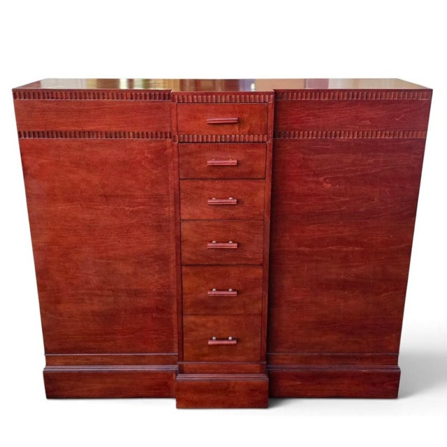 An exceptional and highly unusual architectural commode by the renowned Kittinger Furniture Company of Buffalo, New York....