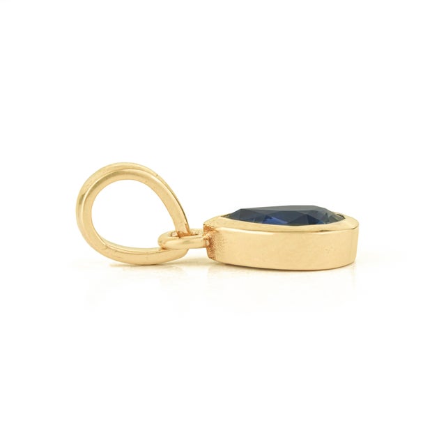 Metal Handcrafted Natural Pear-Cut Blue Sapphire Solitaire Pendant in 14k Yellow Gold For Sale - Image 7 of 15