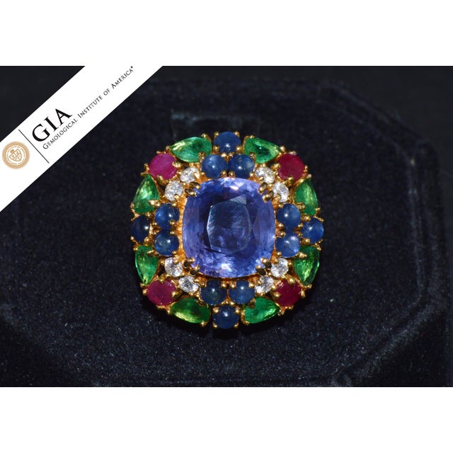 GIA certified 11.84CTS diamond, ruby, emerald and sapphire 18K solid gold ring. This ring features a huge 7.63CTS natural...