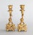 A superb pair of antique 19th Century French gilded bronze ormolu two arm candelabras. The decoration of the candelabras...