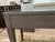 Two drawer writing desk in gray faux shagreen with elegantly tapered legs. Custom glass protective top included.