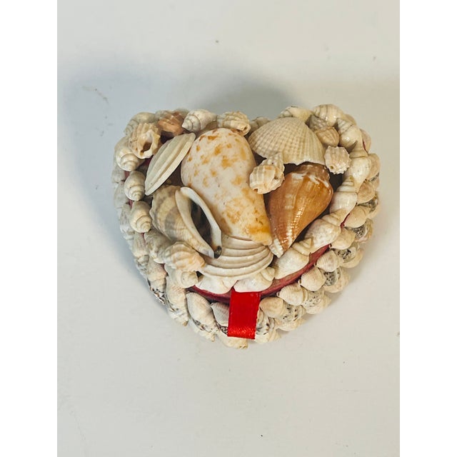 Cute small vintage folk art Dailors Valentines sea Shell encrusted heart shape box with red velvet inlay.