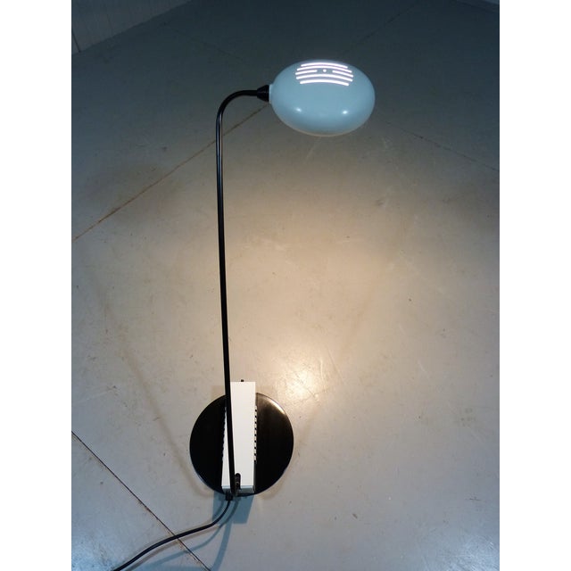Halogen desk lamp, Italy. Unusual shaped black and white steel foot, black steel arm, white steel adjustable shade....