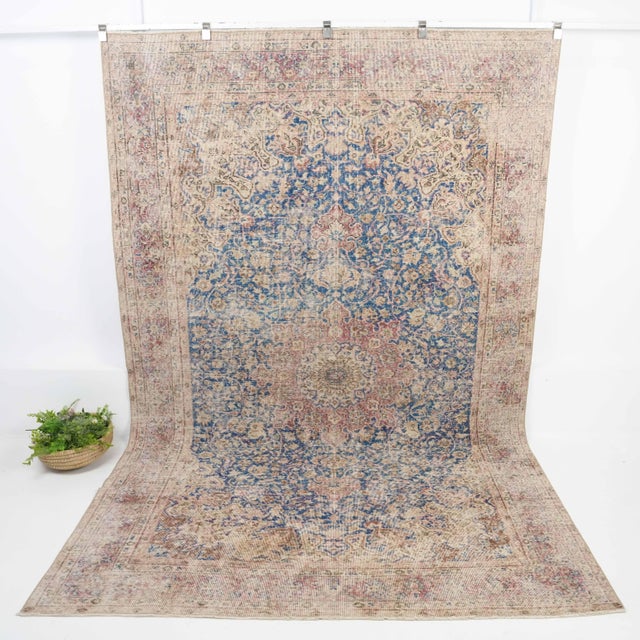 Vintage Turkish Hand-Knotted vintage rug is a semi-antique vintage Area rug.'70s Eastern region of Turkey's unique rug is...