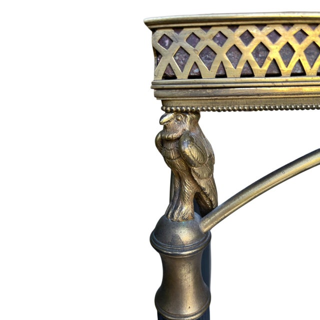 Empire-Style Patinated and Gilt-Bronze Table with Red Porphyry, in Very Good conditions. Designed before 1890 I have...