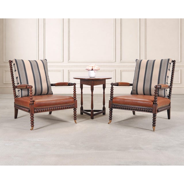 A pair of sophisticated "New Bohemian Spindle Chairs", designed by Ralph Lauren as part of Ralph Lauren's New Bohemian...