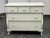 Design Plus Gallery presents the Genevieve Dresser from Pottery Barn Kids. The dresser is in an antique white painted...