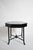 Faux bamboo octogonal table, 1910s. Ebonised wood octagonal table with four faux bamboo wooden legs joined by a spacer in...