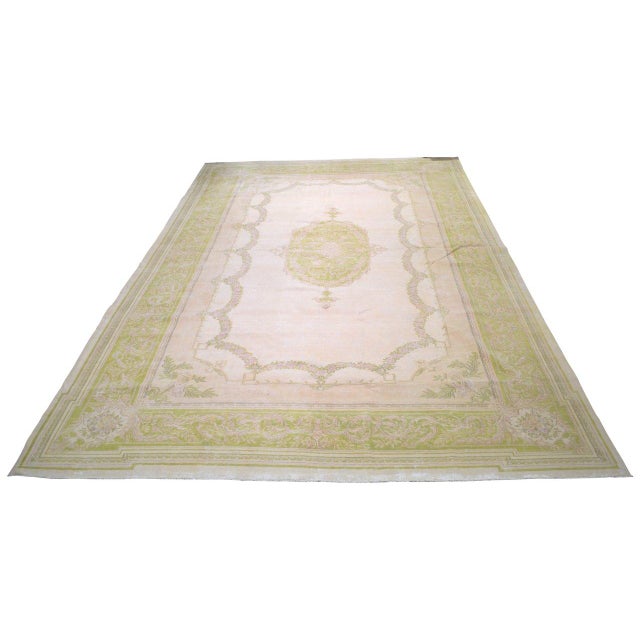 Hand-knotted with care using traditional rug-making techniques, this wool rug blends timeless craftsmanship with a modern...