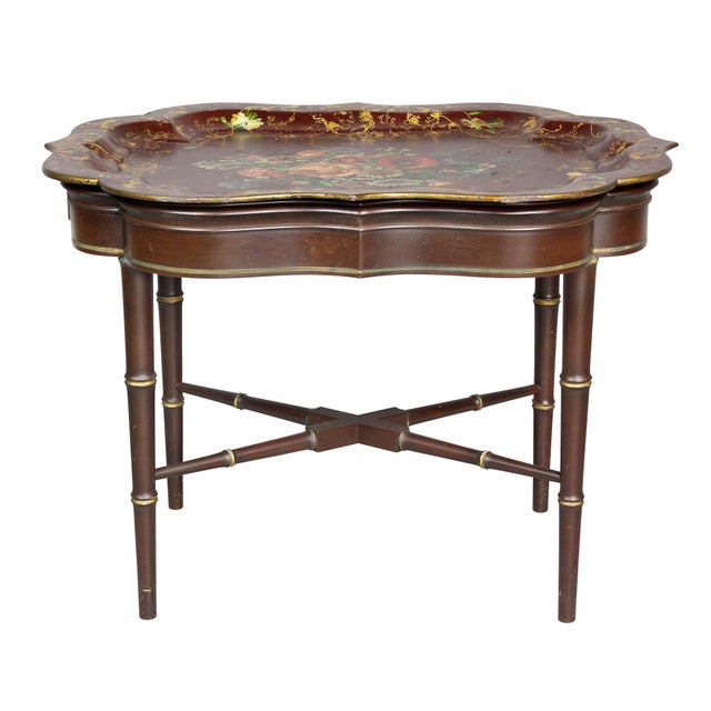 Scalloped shape reddish brown tray with vibrant floral design, later faux bamboo base. Provenance; Estate of John Volk....
