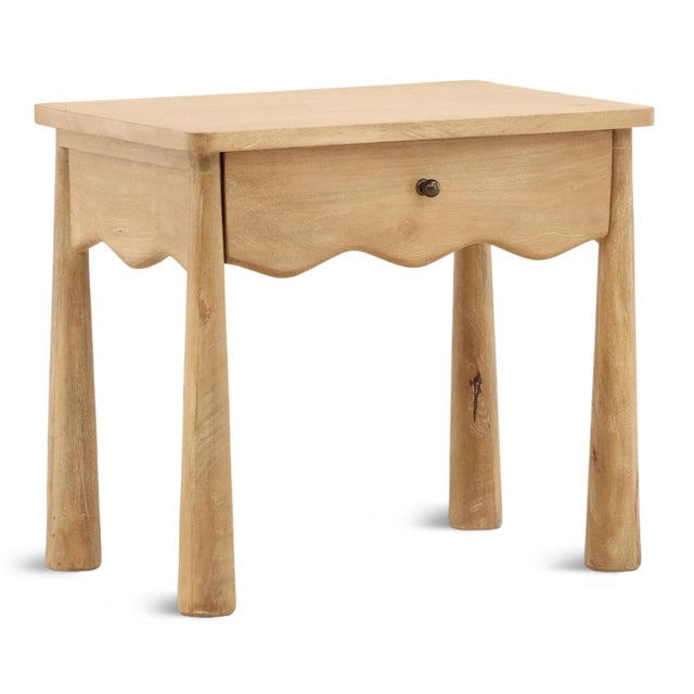 Solid mango wood nightstand featuring a warm natural finish that highlights the organic beauty of the material,...