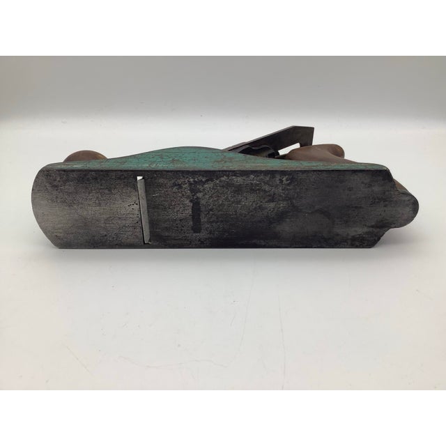 Antique Stanley hand planner. The planner is marked with the company name Stanley, and MADE IN USA infant of the handle....