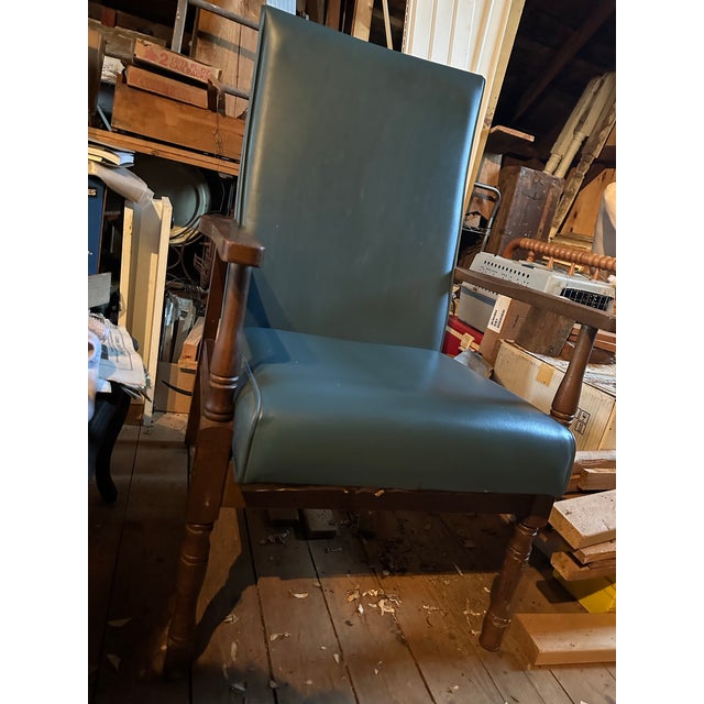 Teal, vinyl vintage lounge chair. Possibly Parker knoll, not positive. Pretty good condition, these pictures were taken...