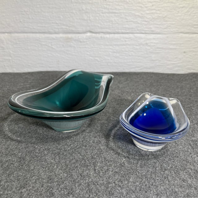 Consists of a blue & white & green & white glass bowl encased in clear glass, using the Venetian developed sommerso...