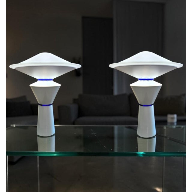 A pair of “Giada” postmodern table lamps designed by Pier Giuseppe Ramella for Arteluce and produced by Flos, Italy, circa...
