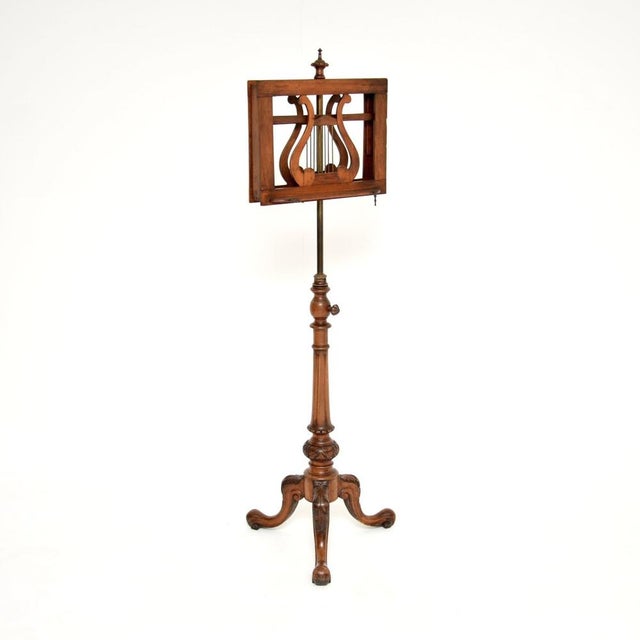 A stunning antique Victorian carved walnut music stand. This was made in England, it dates from around the 1860-1880...
