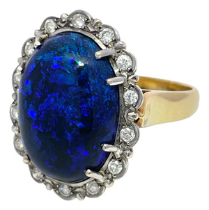Mid 20th Century 18k Yellow/White Gold Oval Cut Center Opal and Diamond Halo Ring, Size 6.25