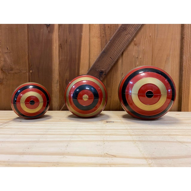 Wonderful set of 3 hard plastic storage containers painted in black, red and gold. These containers or Natsume (tea...