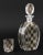 Collection of Four Art Deco Glass Barware Pieces, comprising: Karl Palda attributed black enamel decanter and matching...