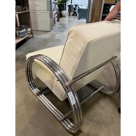 Hudson St. lounge chair embodies American modernism. Crafted from polished stainless steel, the streamlined frame is...