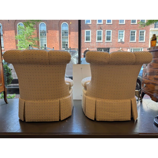This is a pair of vintage slipper chairs. They were made by Century Furniture. They have a channel back. They have a...