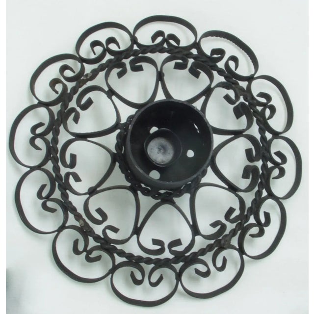 Vintage Italian tole iron candle holder. Able to accommodate both a pillar or taper candle with fitting for both.