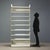 This 1970s-style bookcase/shelf is crafted from white lacquered metal and features a functional and versatile design. The...