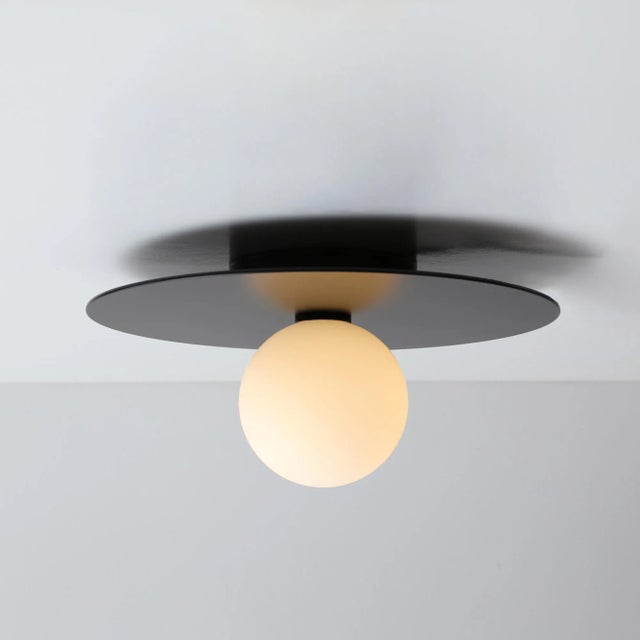 „smbh” is minimalist sconce lamp, it can also be mounted on the ceiling. Glass lamp shade placed centrally on the flat...