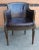 A Mid Century Empire Style full grain Leather Upholstered and Nailhead Studded Mahogany Arm Chair. Measures 22" in width,...