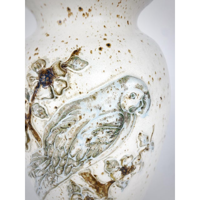 A large, signed 1985 studio pottery vase by American ceramic artists Gus & Leola Gikas, known for their collaborative...