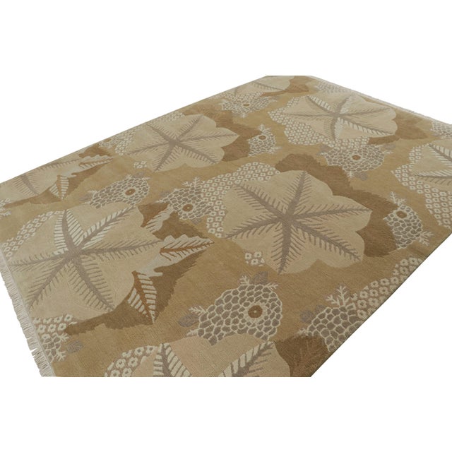 From our Modern Collection, this 9x11 “Clouds” Design in beige/brown, has an element of Art Deco inspiration to it, and a...